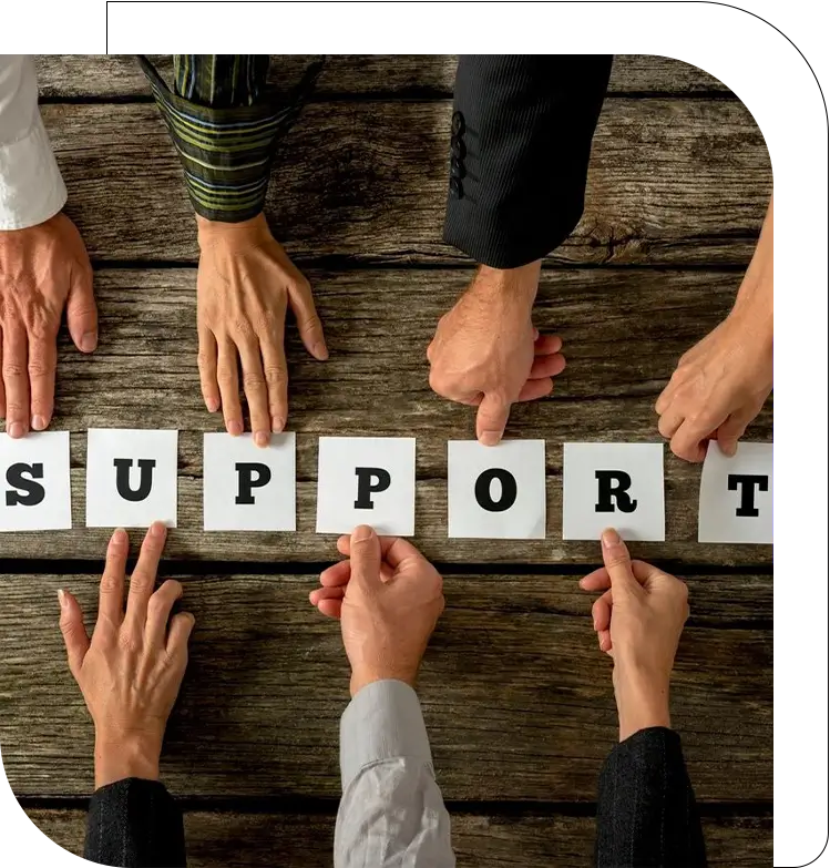 A group of people holding up letters that spell out support.